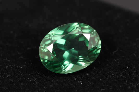 Vivid green sapphire gemstone - nature's rare gem - pure green natural sapphire with brilliant cut - RichosRocks Australia
